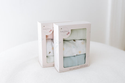 Packaged organic cotton muslin bespoke bundles with a white background